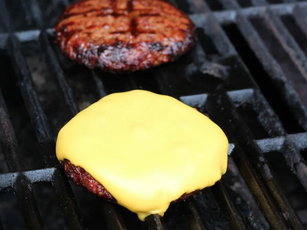 cheeseburgers on a grill