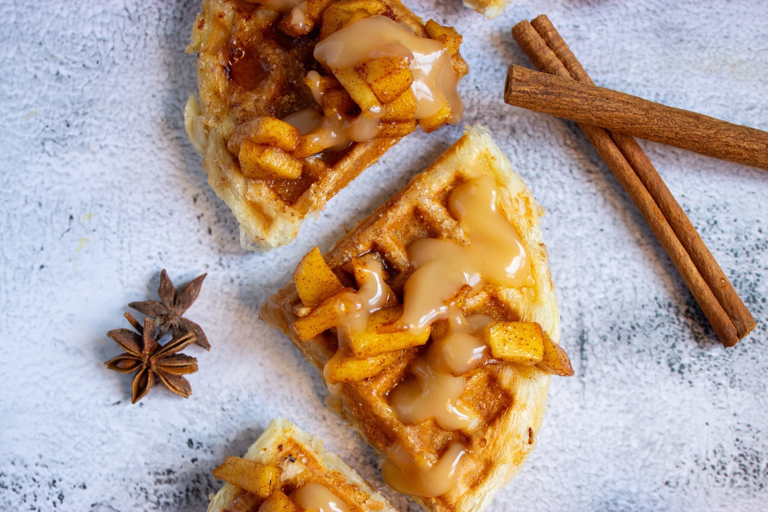 apple pie cheesecake stuffed waffles with salted caramel sauce